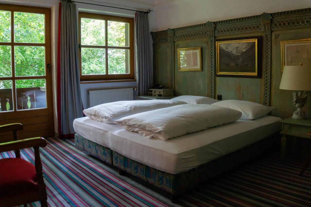 Hotel Schrenkhof Унтерхахинг Экстерьер фото