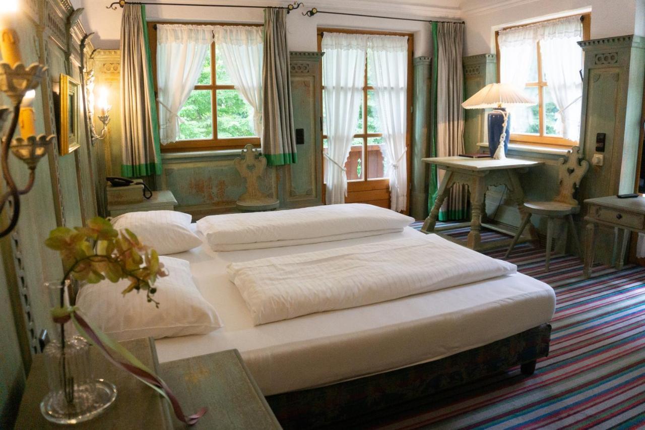 Hotel Schrenkhof Унтерхахинг Экстерьер фото